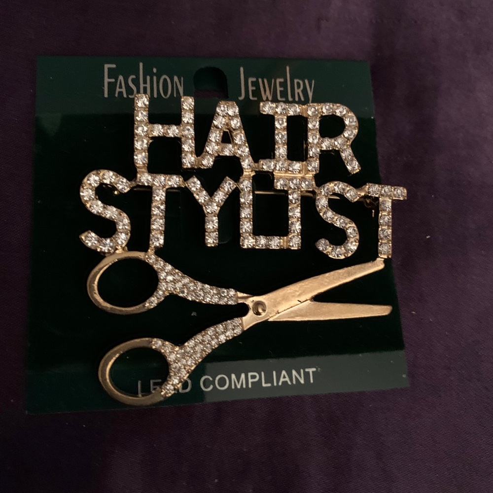 Beautiful gold plated stylish brooch.